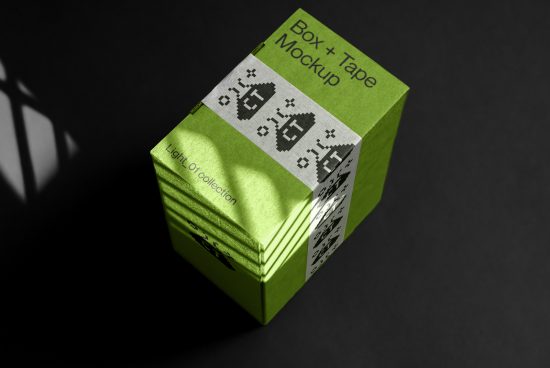 Professional green package mockup with black tape design, showcasing dynamic shadow. Ideal for graphic presentations and brand visualizations.